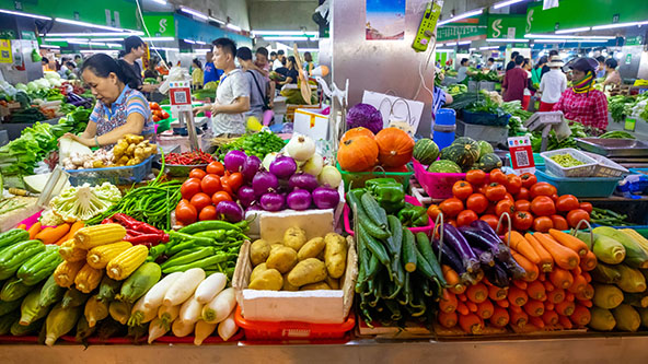 Fresh vegetables and fruits at a local market in Sanya, Hainan province, China