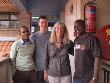 At the Tabitha Clinic in the heart of Kibera: Clinic Manager Mark Muasa Musyoki, Executive Director George Kogolla, Ben Faustine, and myself.