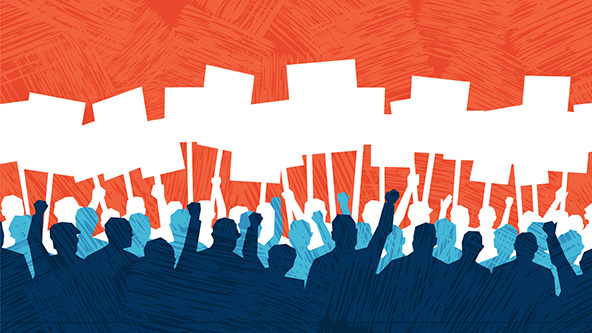 Many people with signs protesting