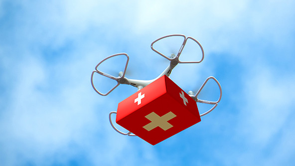 Drone delivering first aid box