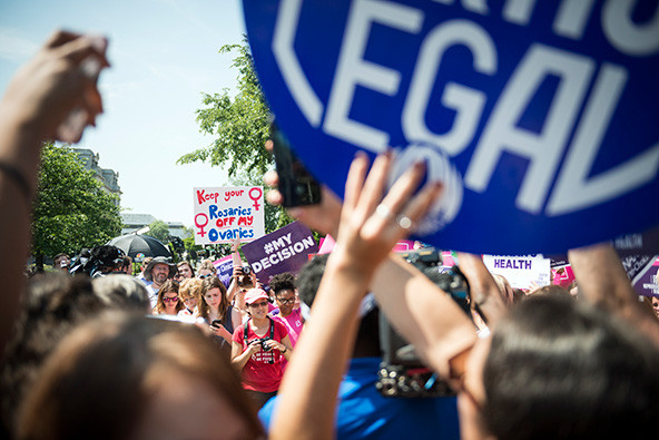 Pro-choice supporters cheer in front of the U.S. Supreme Court.