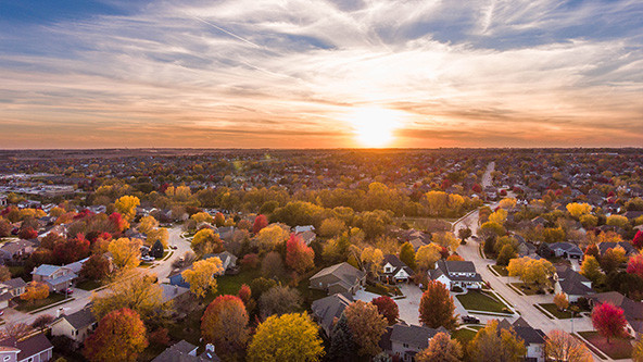 Sunset in the fall over the suburban neighborhood