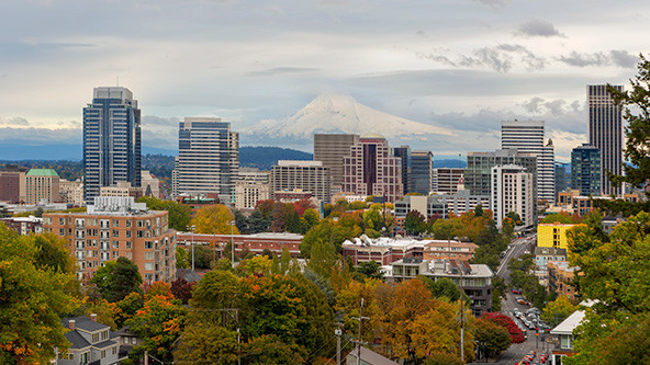Portland, Oregon, downtown city skyline and snow-covered Mount Hood