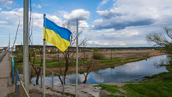 Ukrainian flag beside the Irpin River outside Kyiv