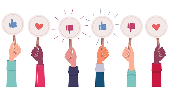 Hands holding signs with the symbols of likes and dislikes, hearts