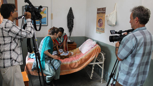 Deb Van Dyke prepares an infant and mother for a film shoot of Global Health Media’s Small Baby series at a rural hospital in northwest Bangladesh in 2015.