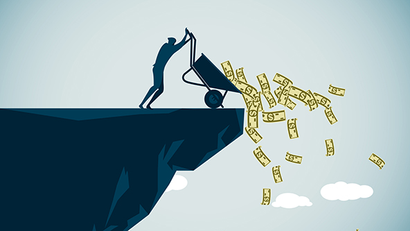 figure emptying a wheelbarrow of cash over a cliff
