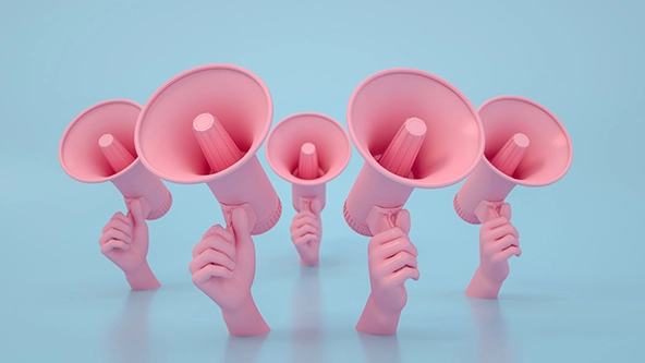 Pink hands holding pink megaphones