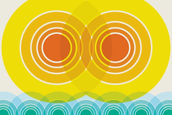two large interconnected circles in shades of yellow and orange