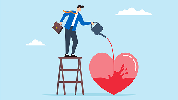 businessman watering a heart
