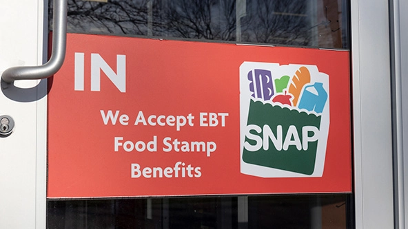 SNAP food stamps sign on a door