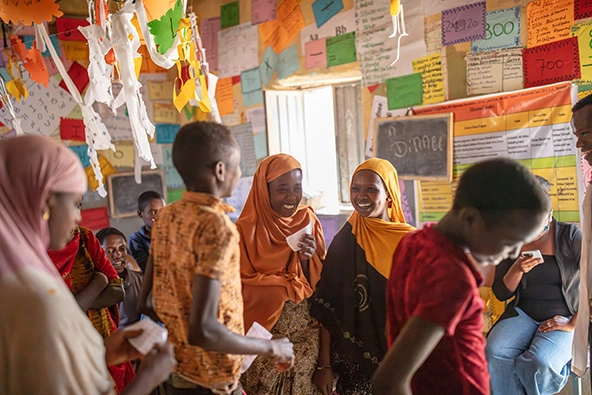 students in a classroom in Ethiopia with colorful posters on the walls
