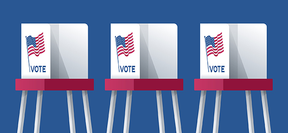 three voting booths with US flags