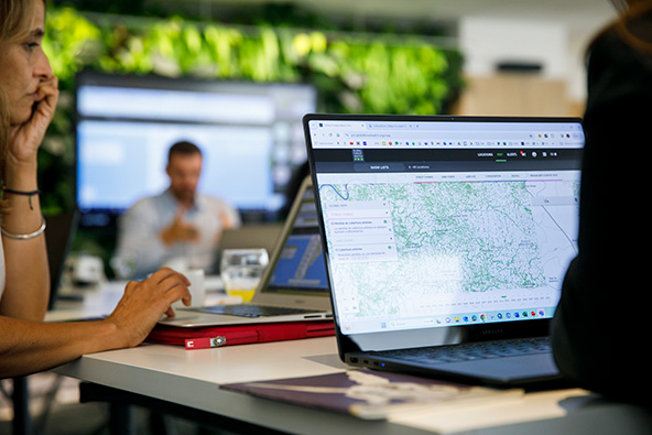 people using ESG performance tools on their laptops