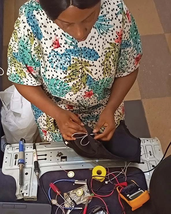 Engineer building a smart bra device