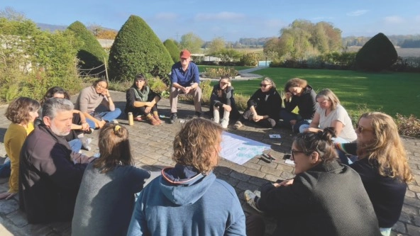 people gathered outside for a team meeting in Switzerland