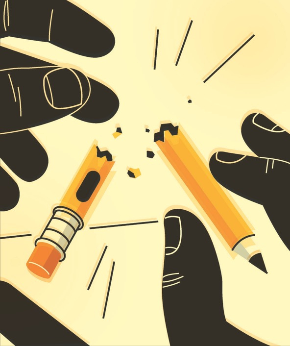 hands breaking a pencil in half