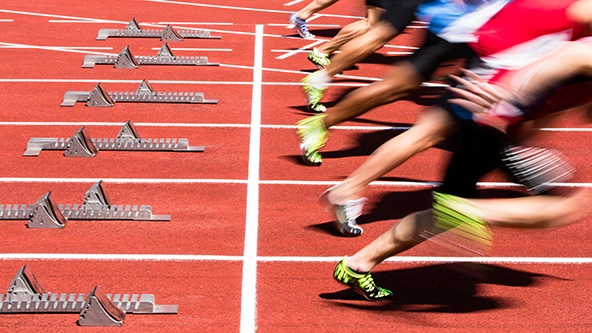 Athletes in a sprint start a race