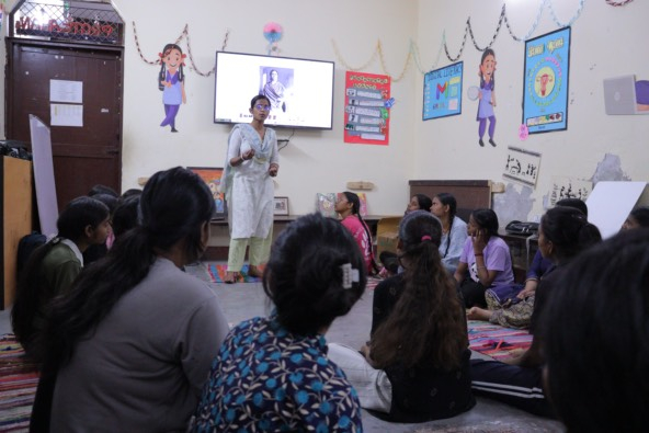 Group of girls in discussion with a Protsahan India Foundation youth leader