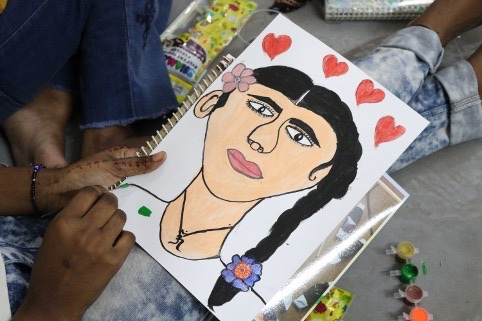 self-portrait painting by girl in the Protosaha India Foundation program