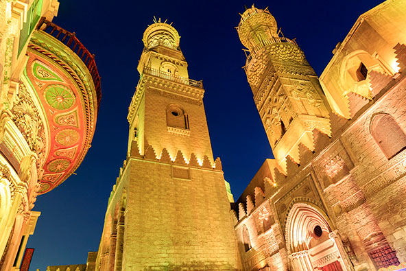 Photo of the Qalawun complex in Cairo, buildings made of stone, brick, and marble
