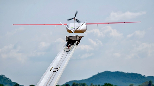 A drone launching into the sky