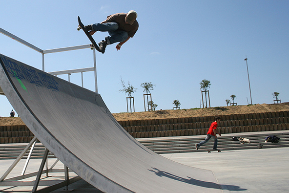 Man jumps with a skateboard