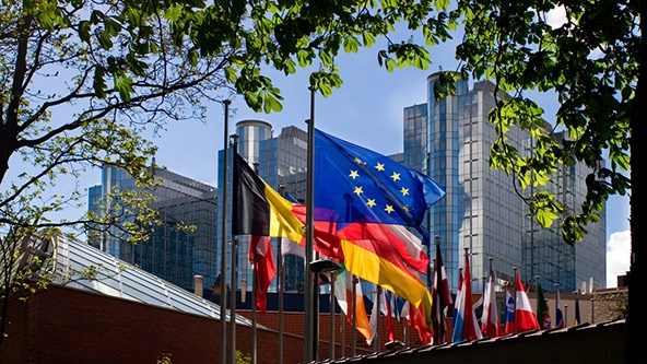 Flags in front of European Parliament in Brussels