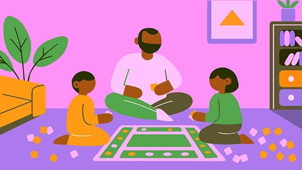 african american dad playing board games with two kids on living rooms floor