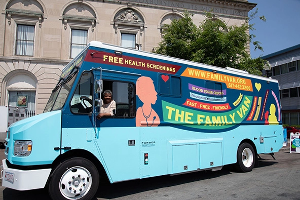 colorful mobile health bus on street