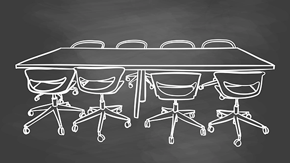 drawing of meeting room furniture on a chalkboard