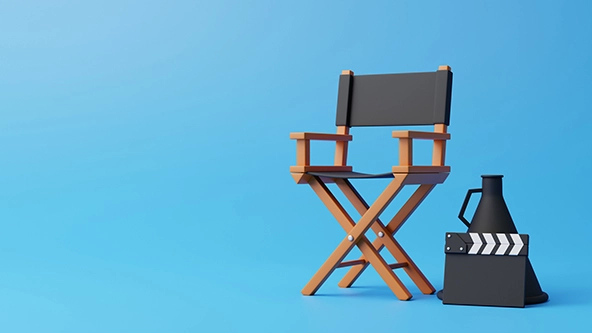 director chair, clapperboard and megaphone on blue background
