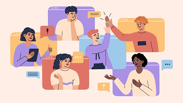 Coworkers interacting with a high five, talking to one another, reading messages on a tablet