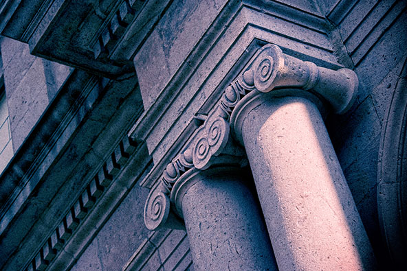 Close up architectural column detail from old building exterior stock photo