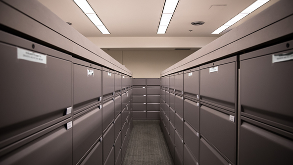 looking down a row of filing cabinets