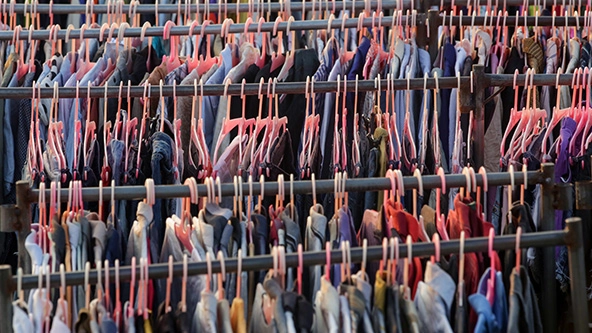 rows of clothing on hangers
