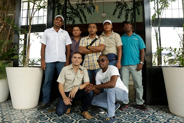 Seven people facing the camera for a group photo