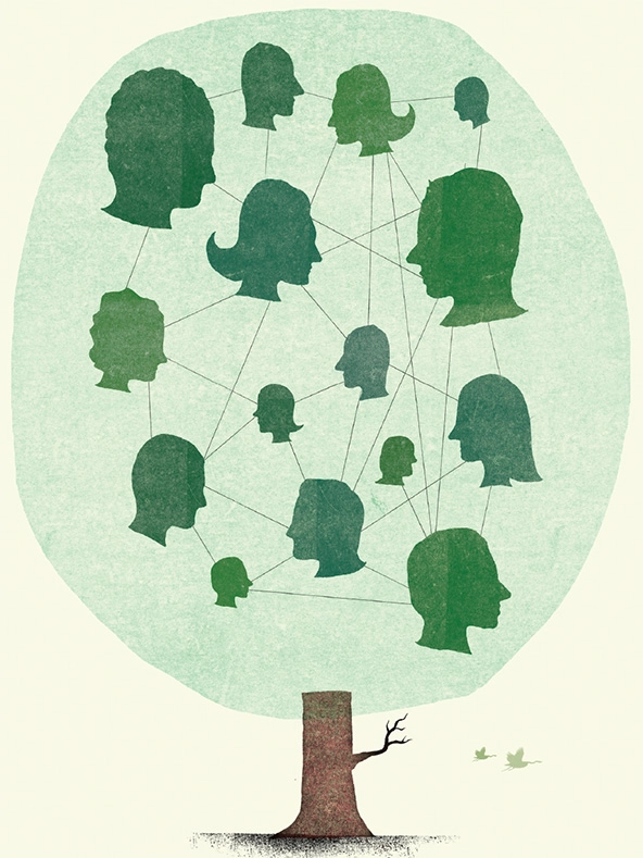 Silhouettes of faces in a tree.