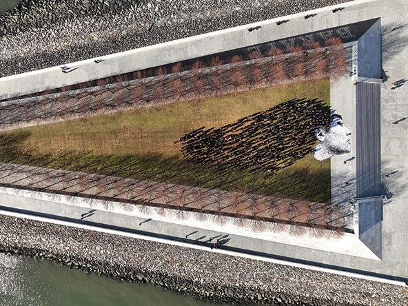 Aerial photo of interactive art installation showing profile of woman with flowing hair