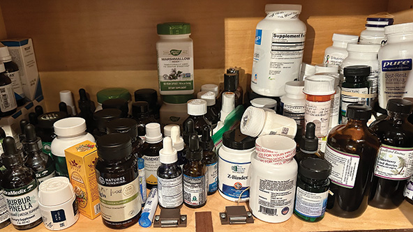 cabinet full of medicine bottles