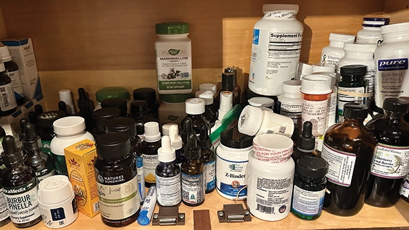 cabinet full of medicine bottles