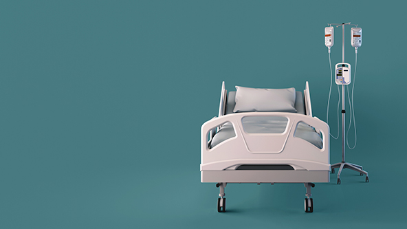 Front view of hospital bed and IV stand