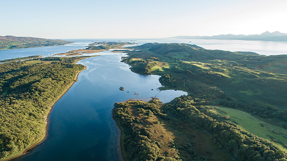 Aerial view of water and land in Scottish Highlands