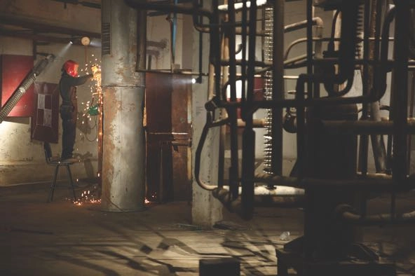 artist working on art installation at the Tolon Museum of Modern Art