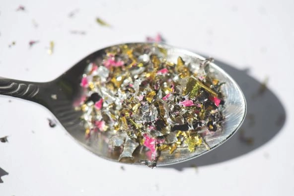 material in a spoon close-up