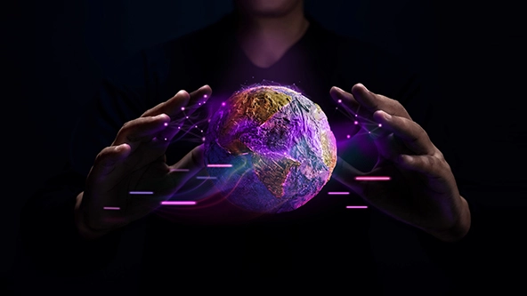 Hands gesturing around a  levitating globe