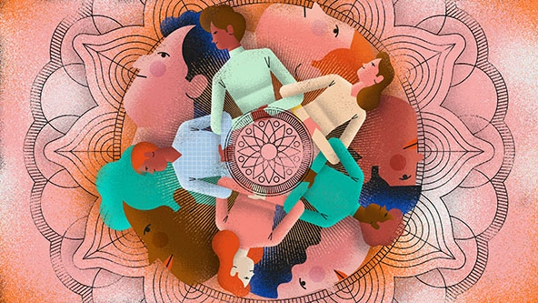 Mandala with people interlinking arms, faces, and flower-like designs.