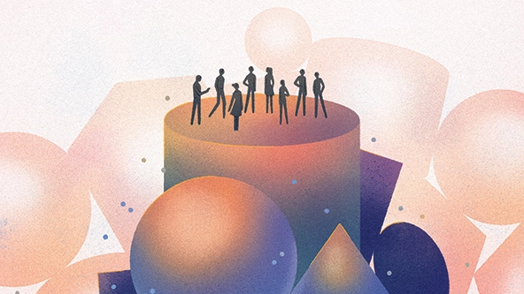 Group of eight men and women standing together on a pile of shapes