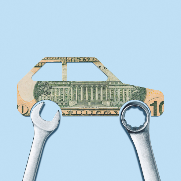 car made of a ten dollar bill with wrenches over the wheels