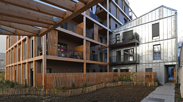 Construction on an outdoor garage converting it into housing units